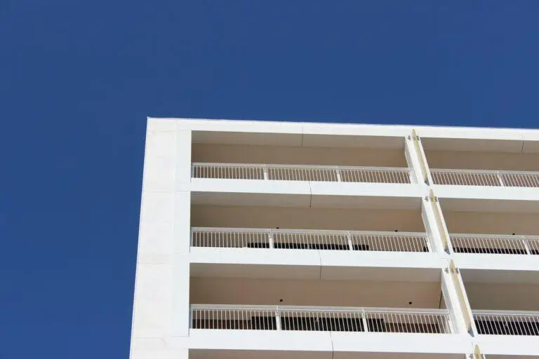 white concrete building under blue sky during daytime